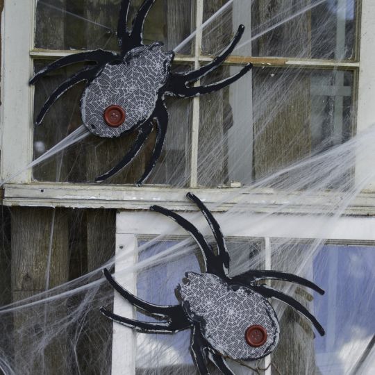Need a craft project? Set of 2 Unfinished Wood Spiders $8.99