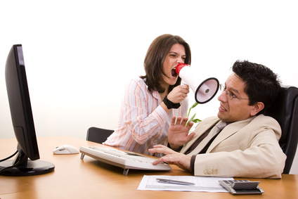 businesswoman shouting with her office worker (selective focus)