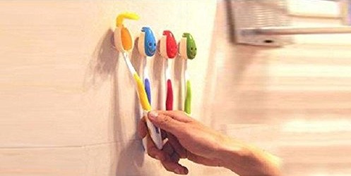 Four Smilie Face Toothbrush Covers With Suction Cups Only $2.40 SHIPPED!!